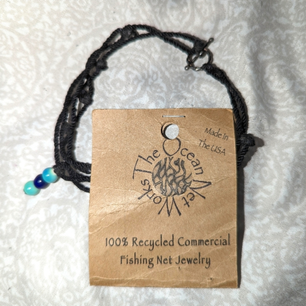 Recycled Fishing Net Bracelet - black net rope with blue beads and toggle clasp